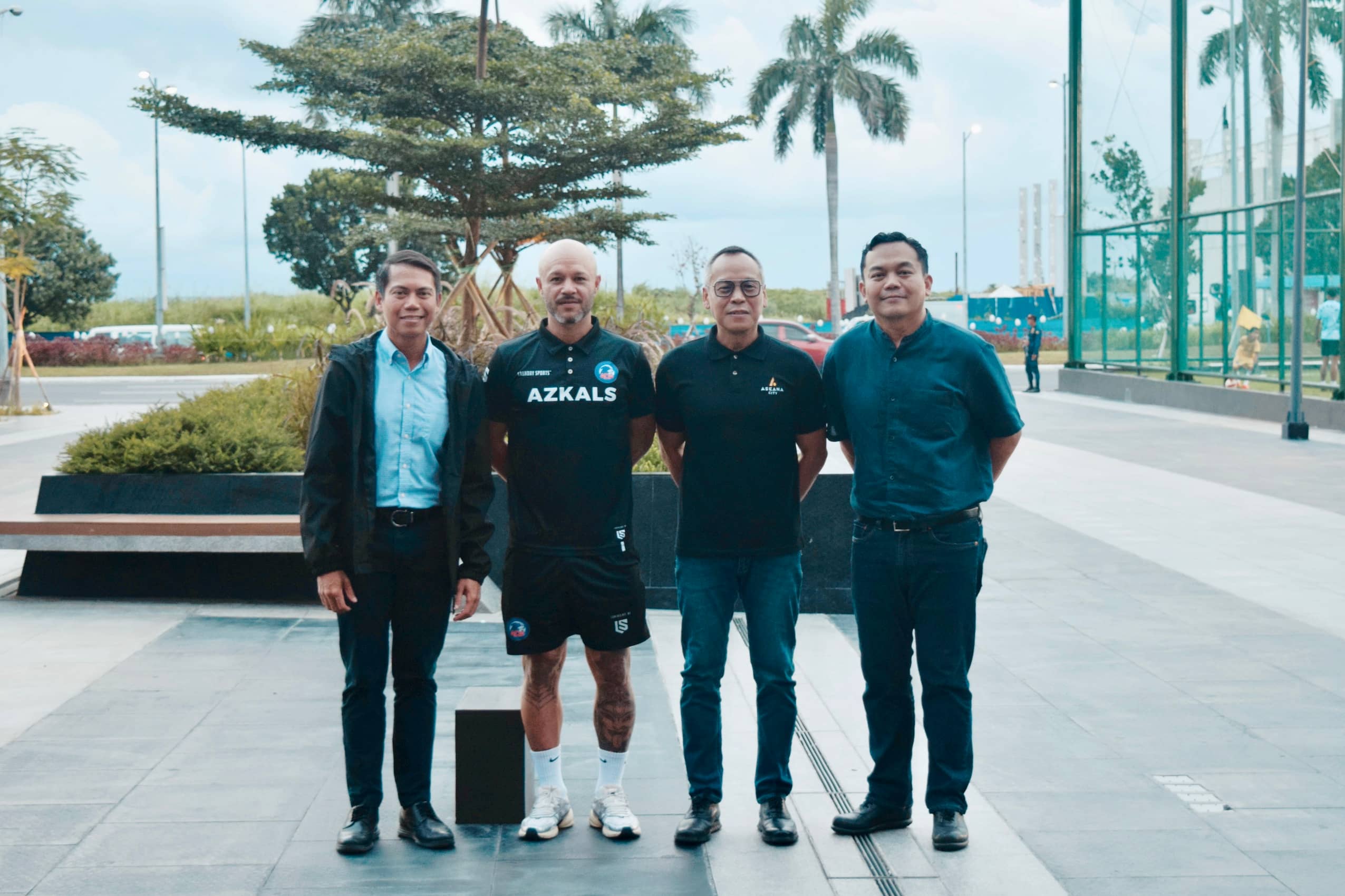 (From left) DMWAI executives Buds Wenceslao, Carlos Wenceslao, and Paolo Wenceslao, with Stephan Schrock of the Azkals Development Academy